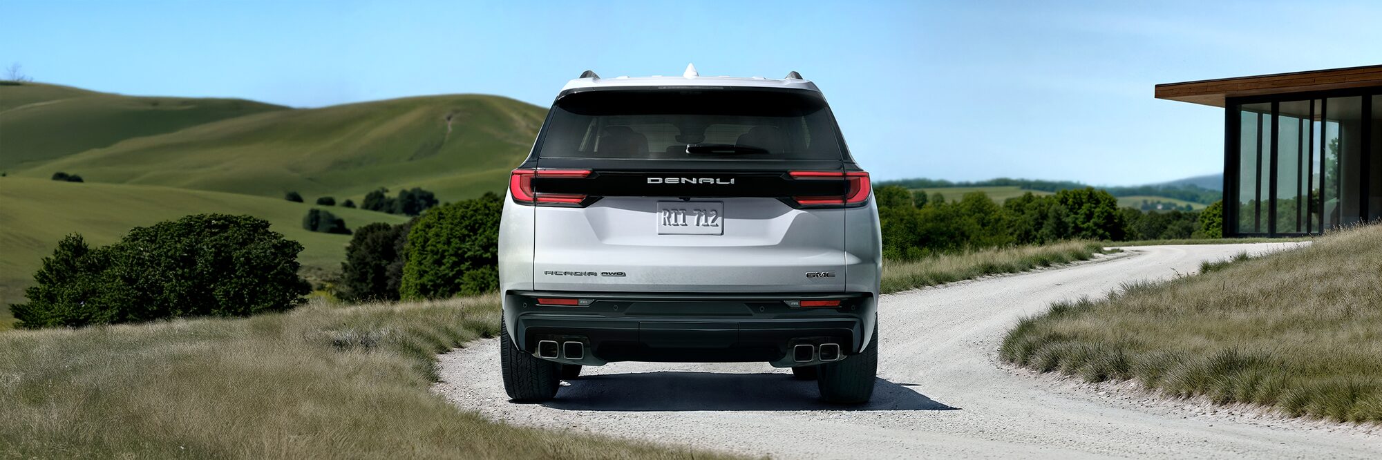 my26-acadia-mov-exterior-header-denali-ultimate-vader-chrome-grille