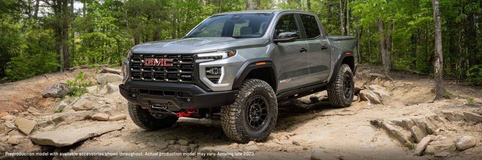 Front Three-Quarter View of a Silver GMC Sierra AT4X AEV Edition Pickup Truck