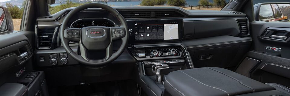Interior View of the Steering Wheel and Dashboard in the GMC Sierra AT4X