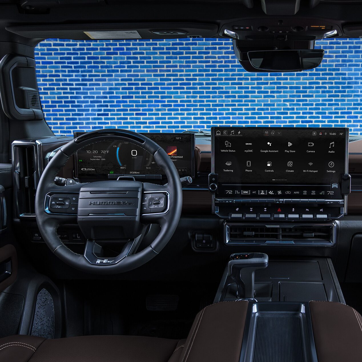 Interior View of the Steering Wheel and Infotainment Screen in the GMC HUMMER EV SUV