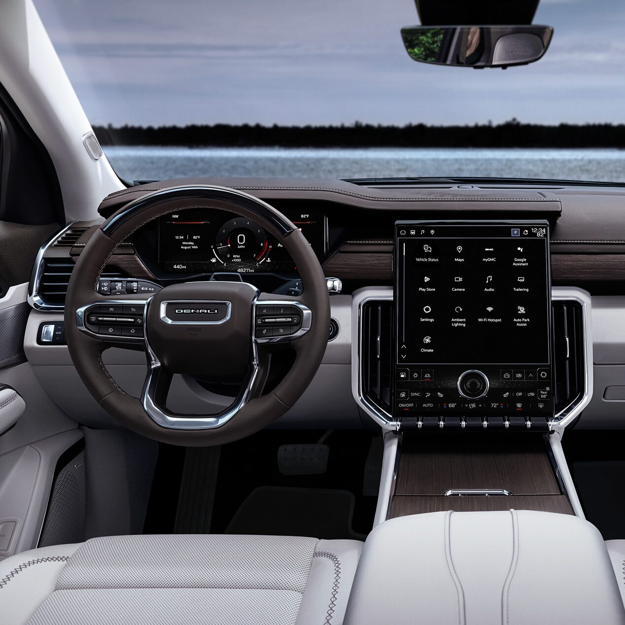 Interior View of the Steering Wheel and Infotainment Screen in the GMC Acadia Mid-Size SUV