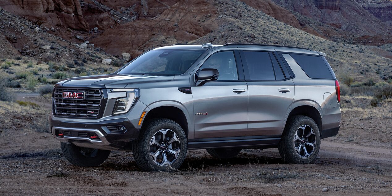 Front Three-Quarters View of the GMC Yukon Parked on a Dirt Road