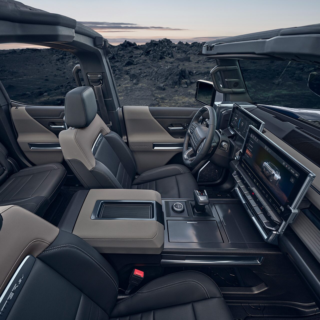 Interior View of the Steering Wheel and Infotainment Screen in the GMC HUMMER Electric Truck