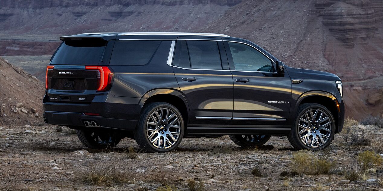Rear Three-Quarter View of the 2025 GMC Yukon Large SUV Parked in the Desert