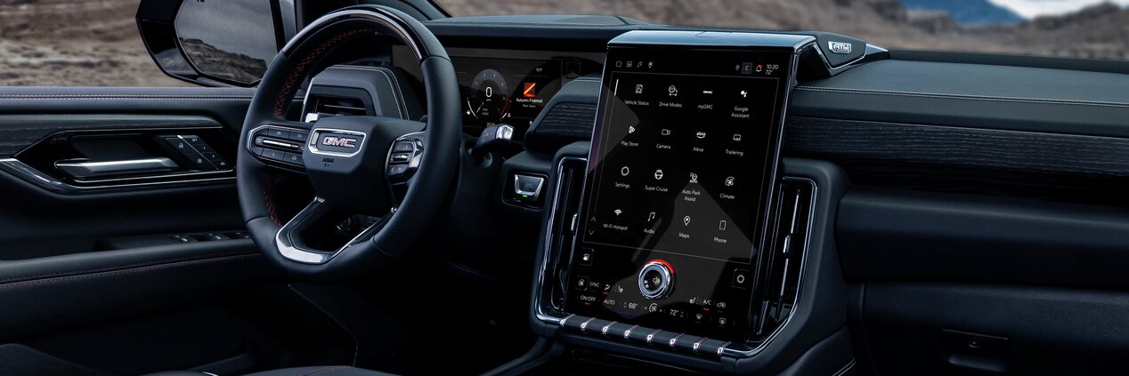 Passenger Side View of the GMC Yukon Steering Wheel and Infotainment System