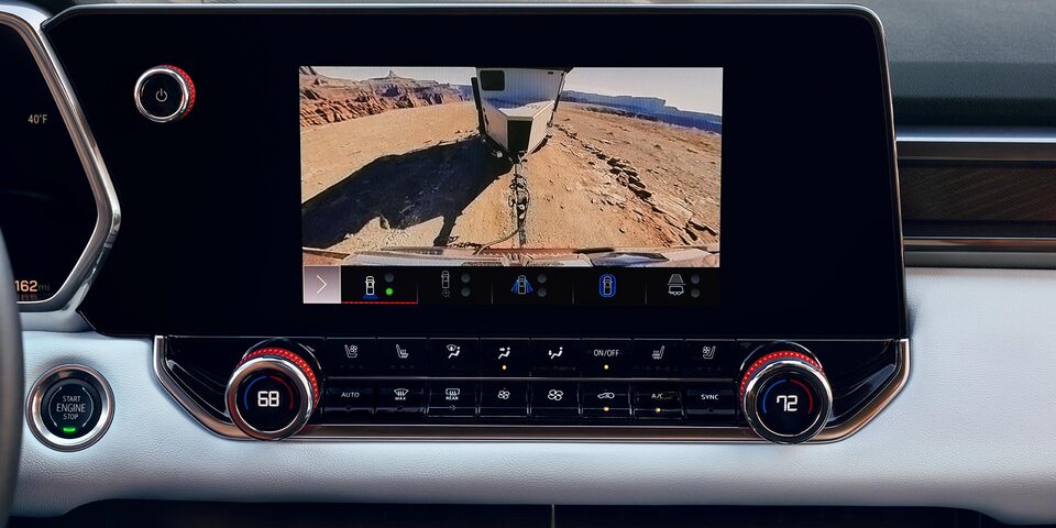 The 2025 GMC Canyon Display Screen Showing Camera View 1 Towing a Trailer