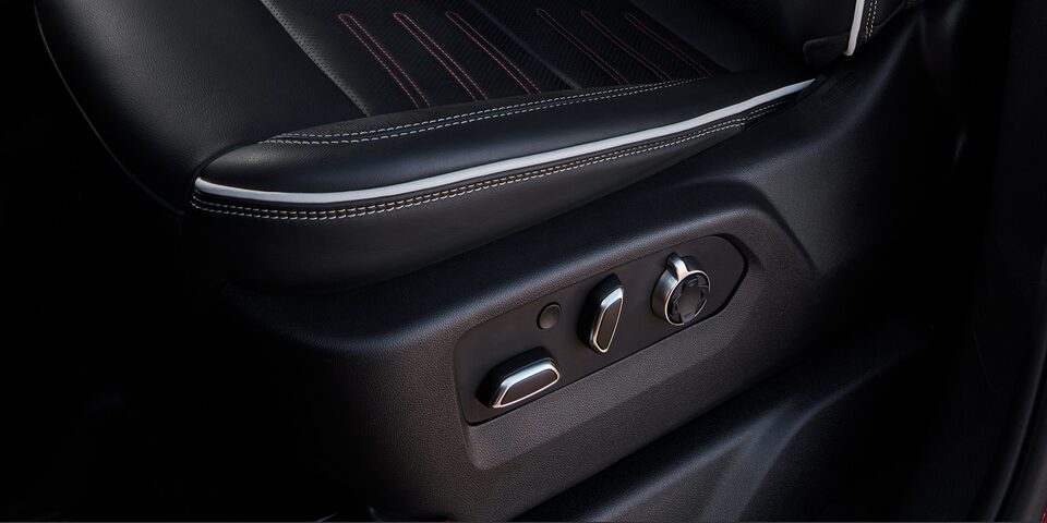 Close-up View of the Seat Controls in a 2025 GMC Sierra HD AT4 Truck