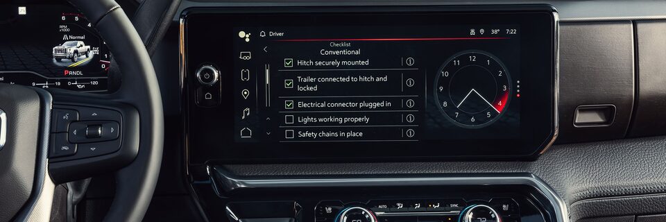 Close-Up of the Towing Checklist on the Infotainment Screen in a 2025 GMC Sierra HD Truck