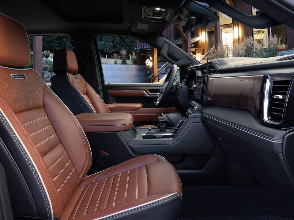 Passenger Side Door View of the Interior Front Row and Leather Seats of the Sierra 1500 Pickup Truck