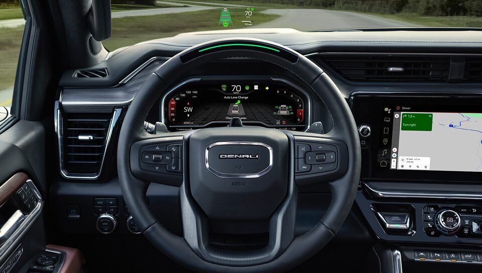 Profile View of a Man Driving Using the Super Cruise Hands-Free Driving Assistance Technology