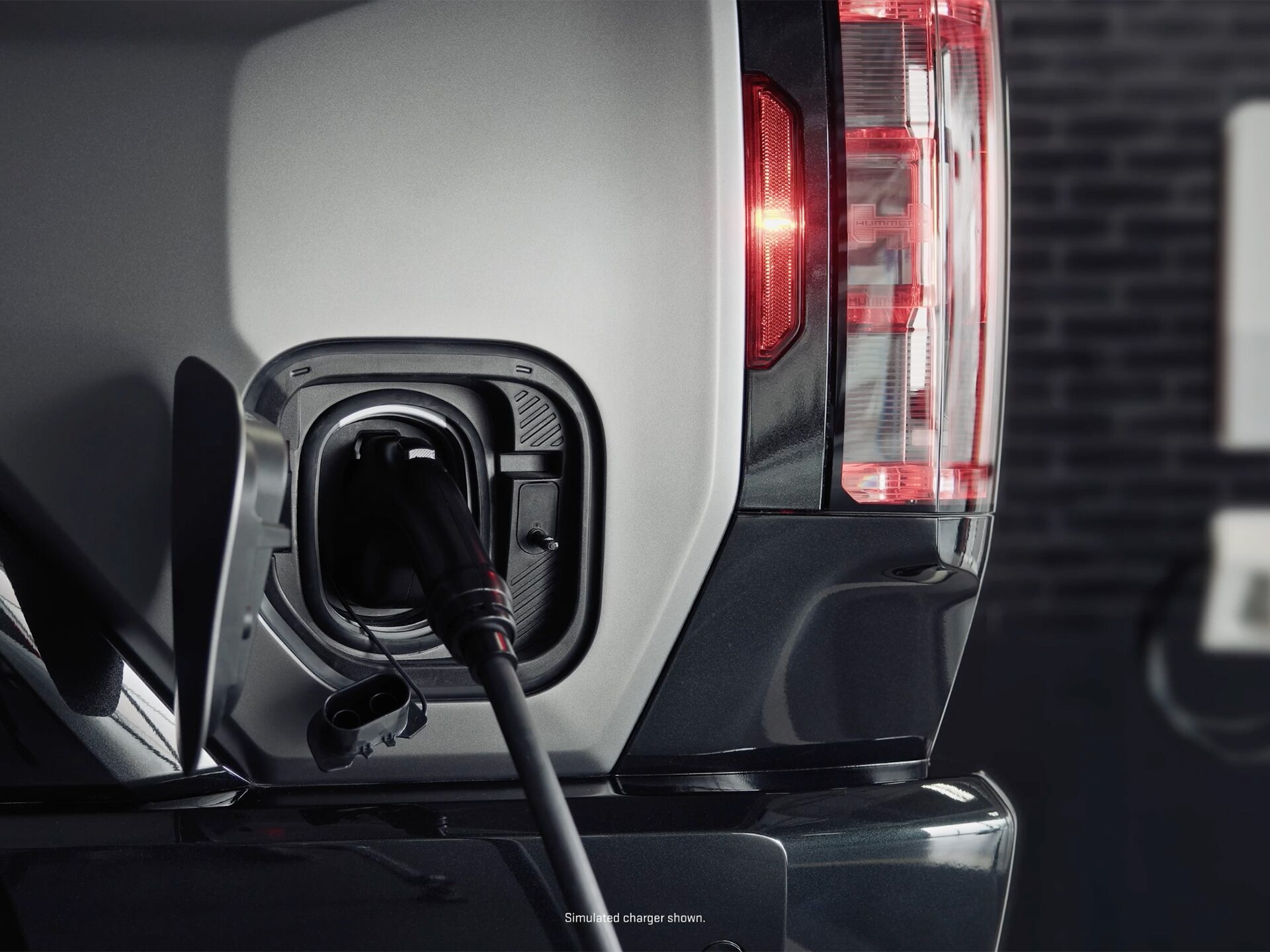 Close-up of an EV Charger in the 2026 GMC HUMMER EV Charging Port