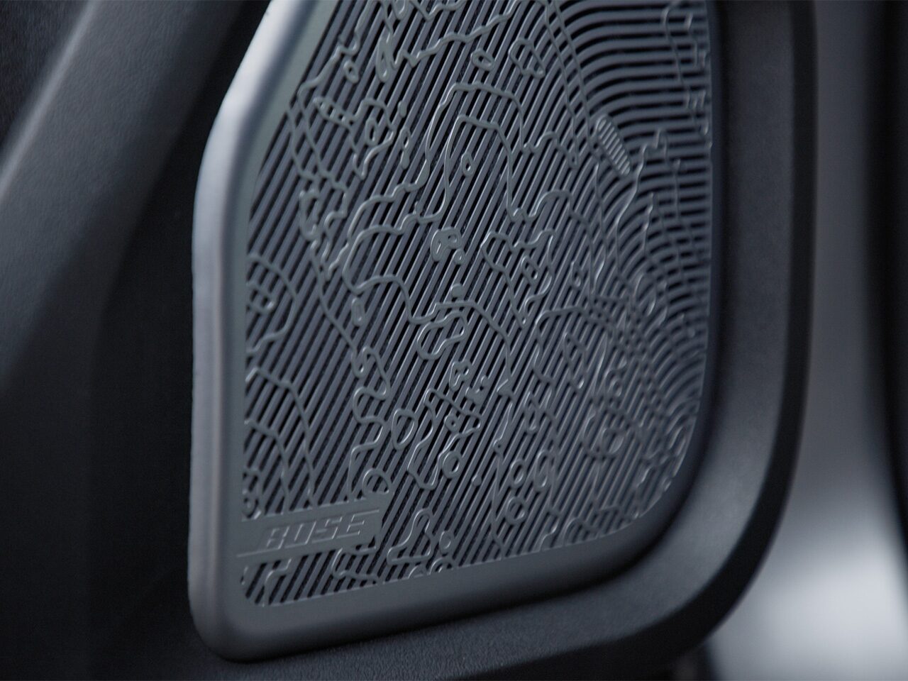 Close-up of the 2026 GMC HUMMER EV Electric SUV Bose Audio System Speaker
