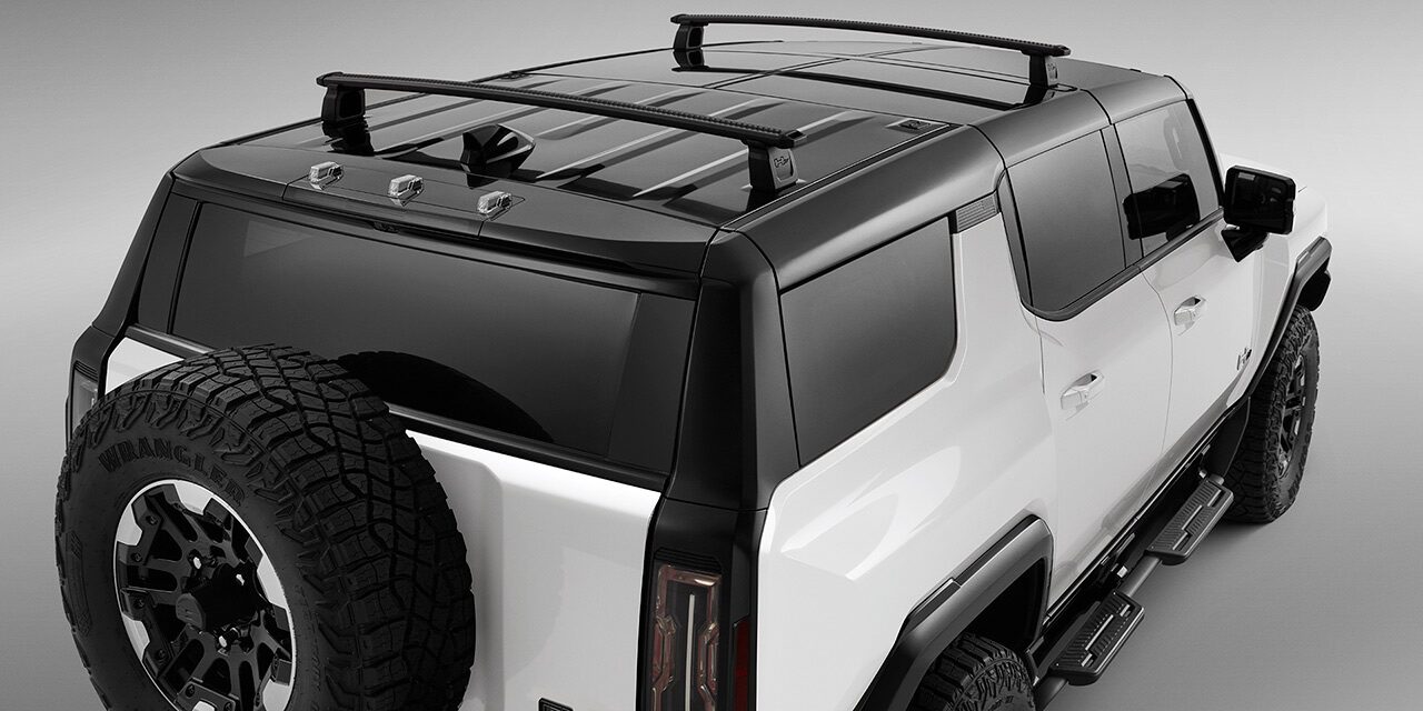 Rear End View of a Personalized 2026 GMC HUMMER EV SUV with Roof Rack Crossbars