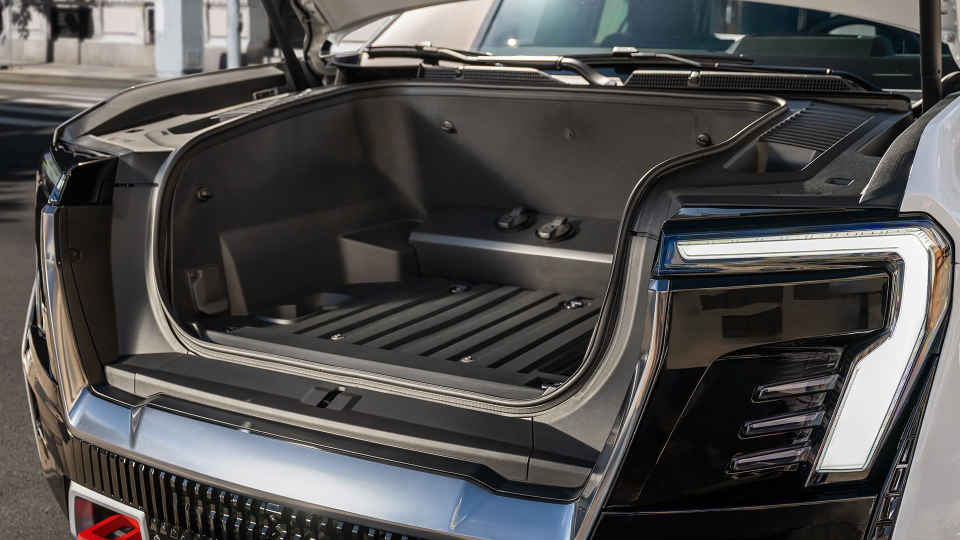 The 2026 GMC Sierra EV Denali with an Open Front Hood to Display the Under-hood Storage