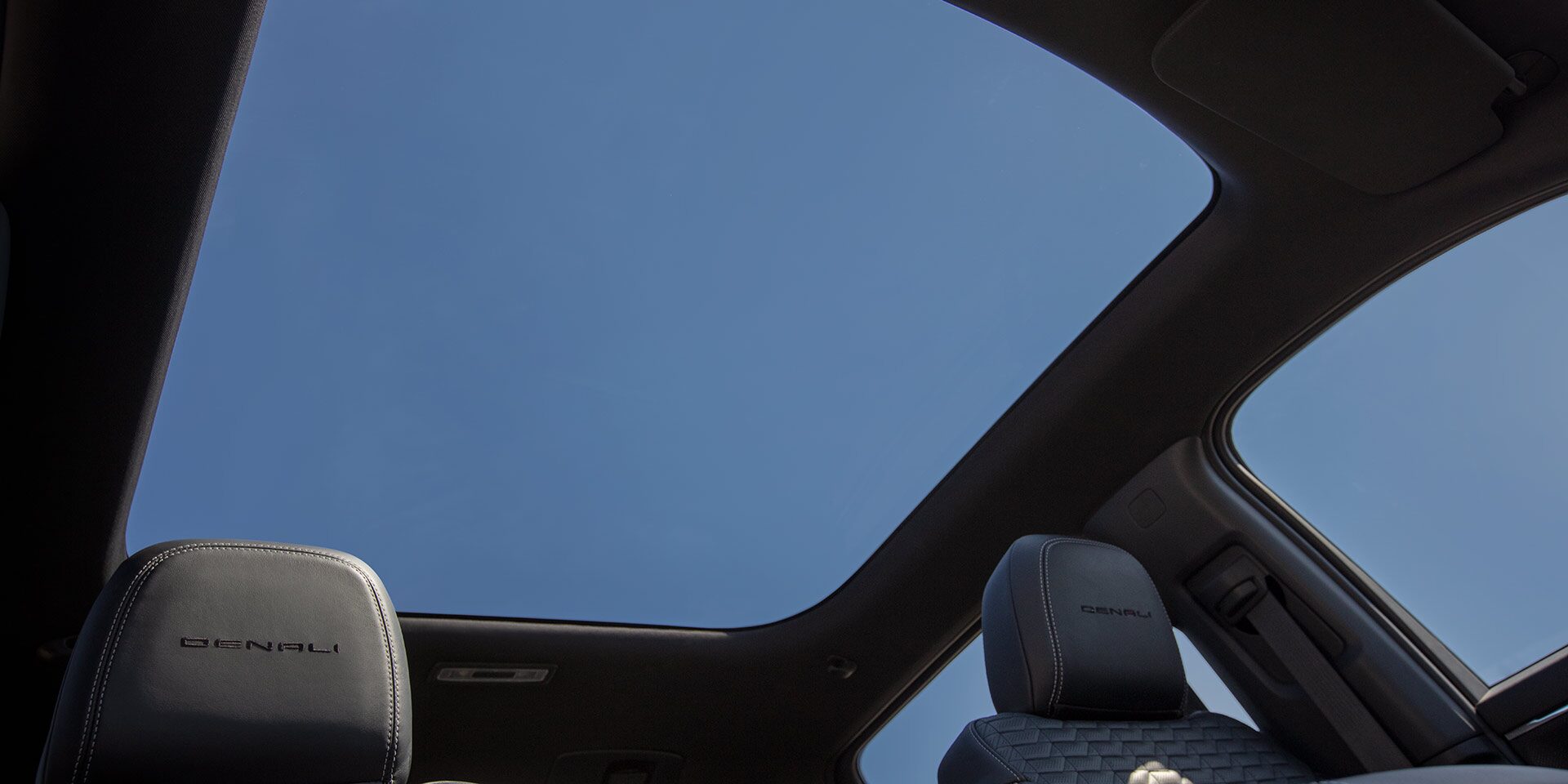 Interior View of the 2026 GMC Sierra EV Denali's Panoramic Glass Roof
