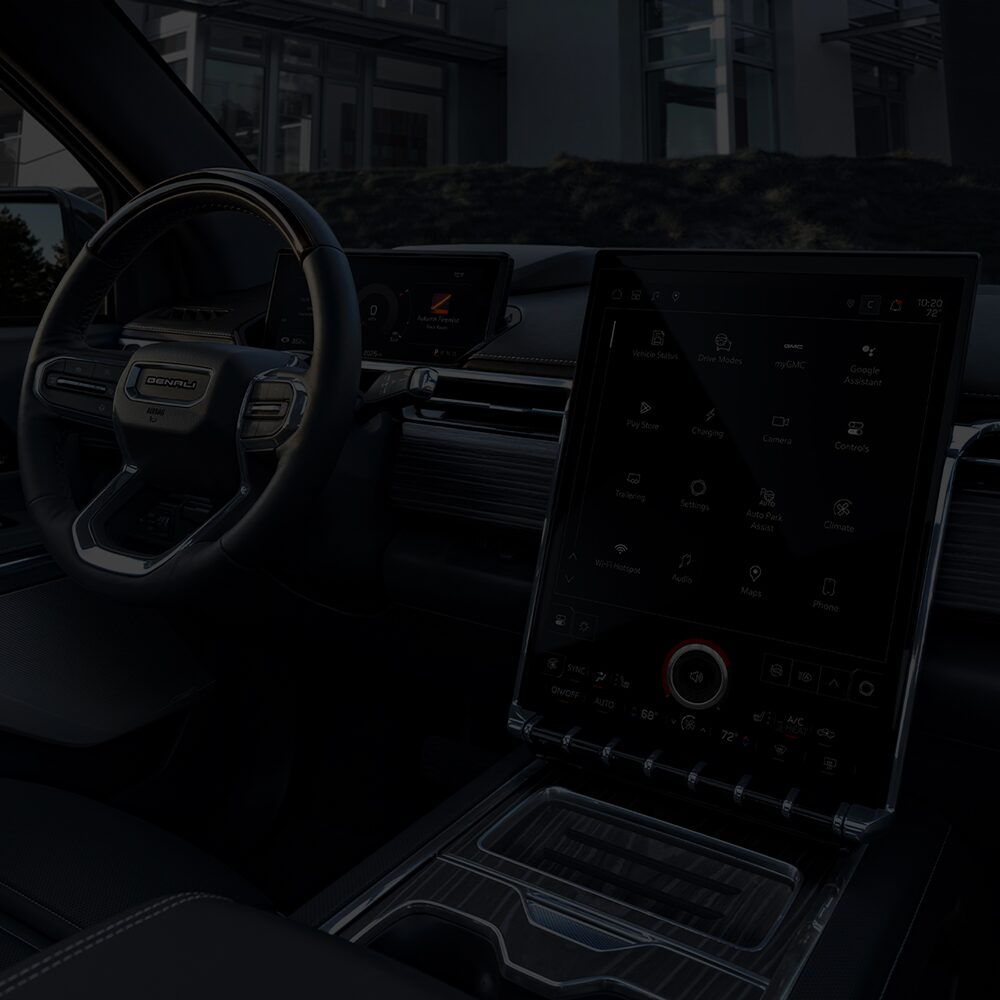 The 2026 GMC Sierra EV's Driver Side Dashboard, Infotainment System, and Center Console