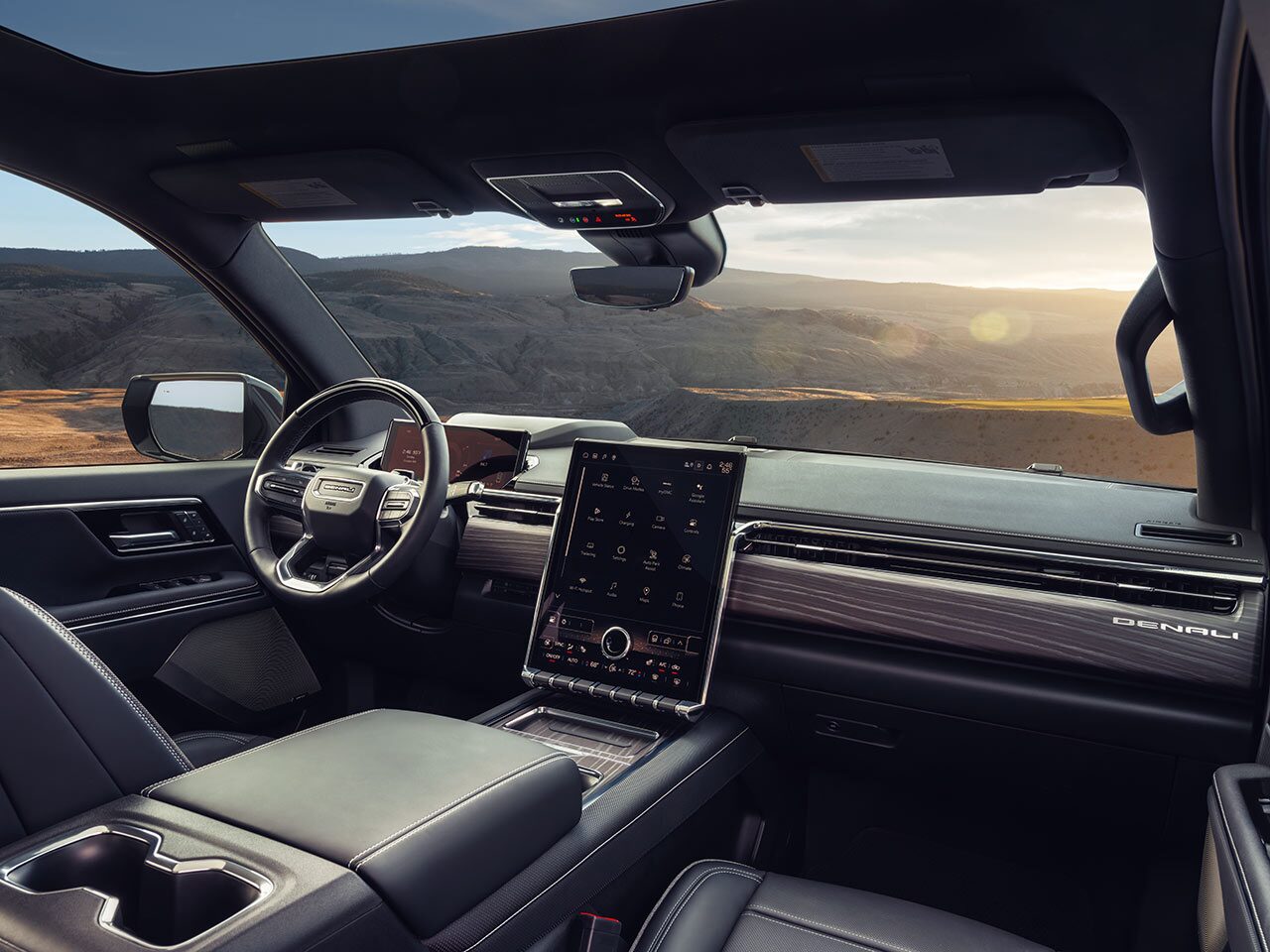 The 2026 GMC Sierra EV Pickup Truck Interior Dashboard and Steering Wheel