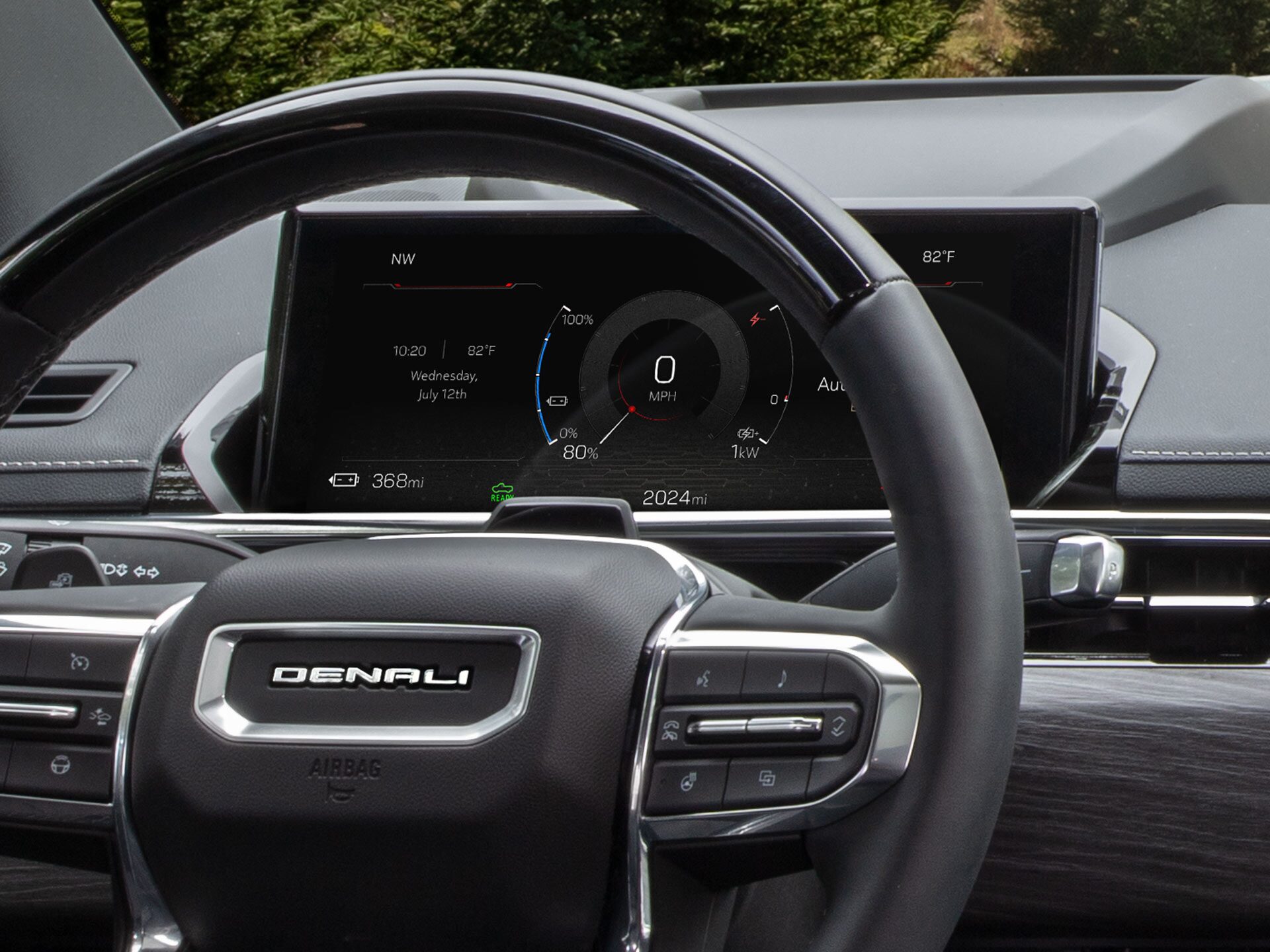 Close-up of the 2026 Sierra EV Pickup Truck's Driver Information Center Behind the Steering Wheel