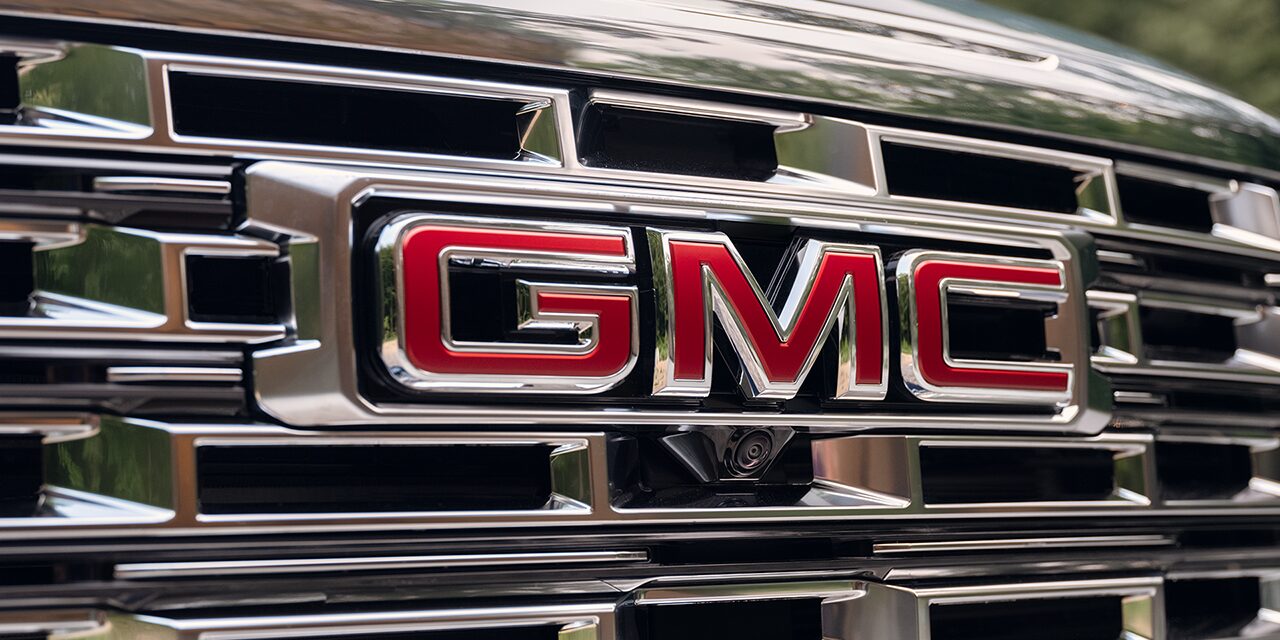 Close-up View of the GMC Logo on the Grille of the GMC Acadia Denali Luxury SUV