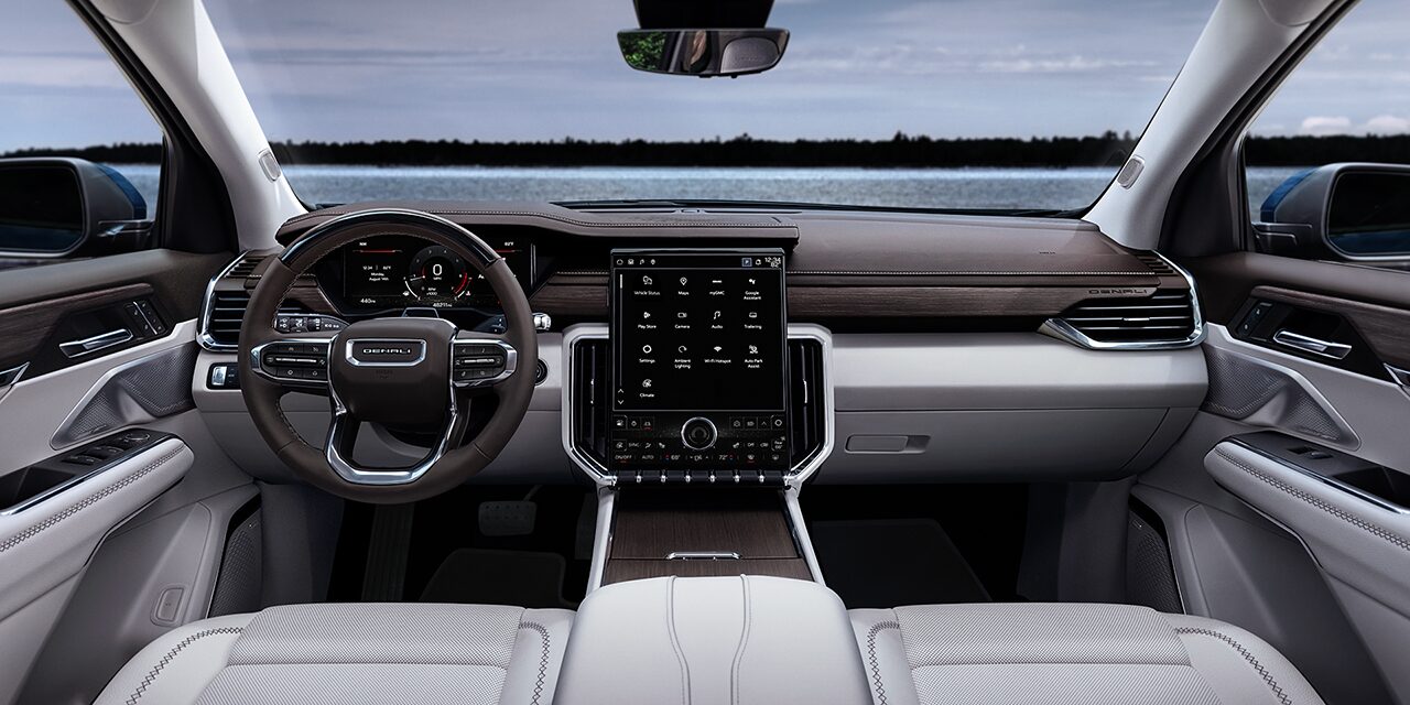 Interior View of the Steering Wheel and Dashboard in the 2026 GMC Acadia Denali Luxury Mid-Size SUV