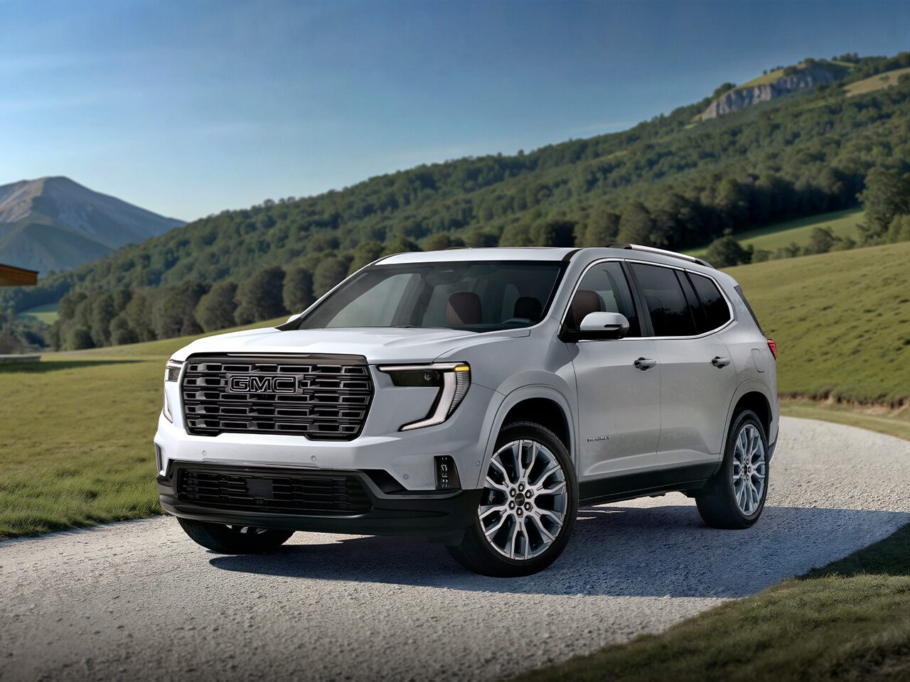 Close-up of the 2026 GMC Acadia Denali Luxury Mid-Size SUV Grille