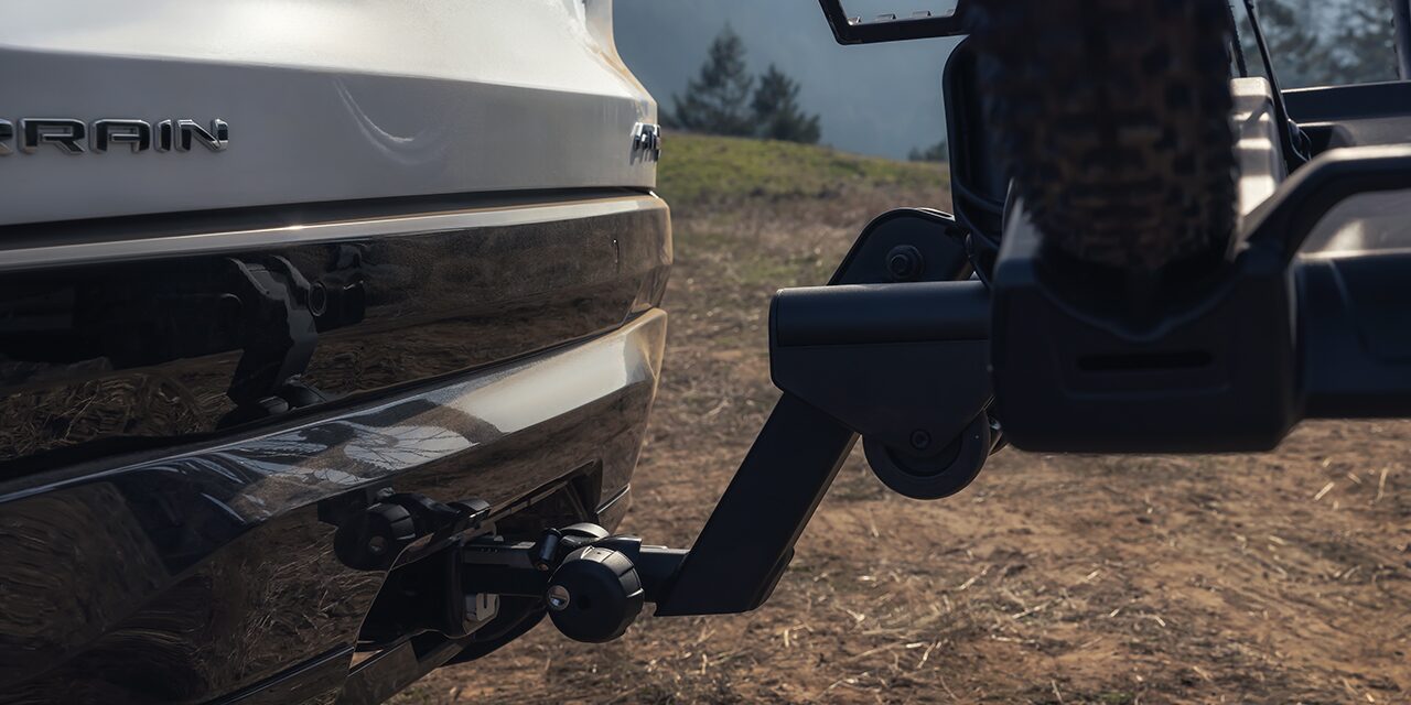 Close-up View of the Hitch on the 2026 GMC Terrain AT4 Small Off-Road SUV Driving Through the Forest