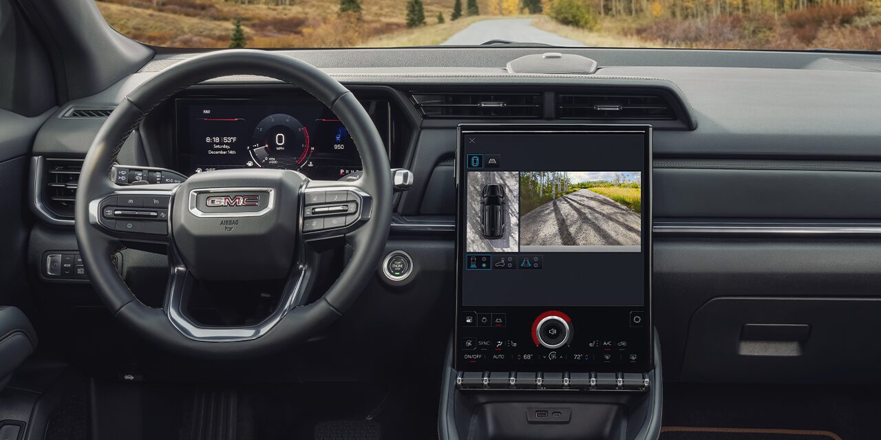 Interior View of the Dashboard, Steering Wheel, and Infotainment System in the 2026 GMC Terrain AT4 Small Off-Road SUV