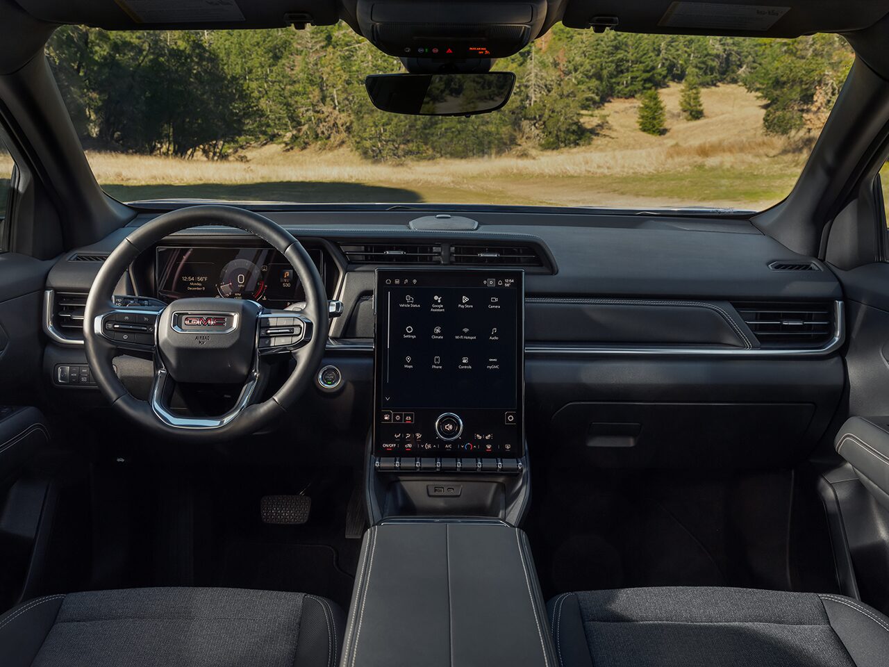 Interior View of the Dashboard, Steering Wheel and Infotainment System in the 2026 GMC Terrain Elevation Compact SUV