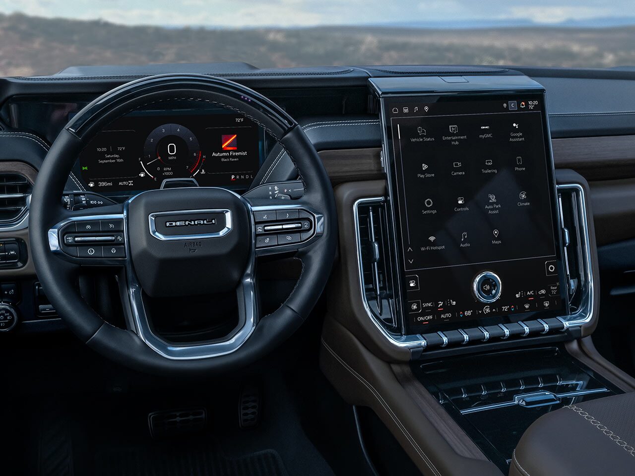 Interior View of the Steering Wheel, Dashboard, and Infotainment System in the 2026 GMC Yukon Denali Luxury 3 Row SUV