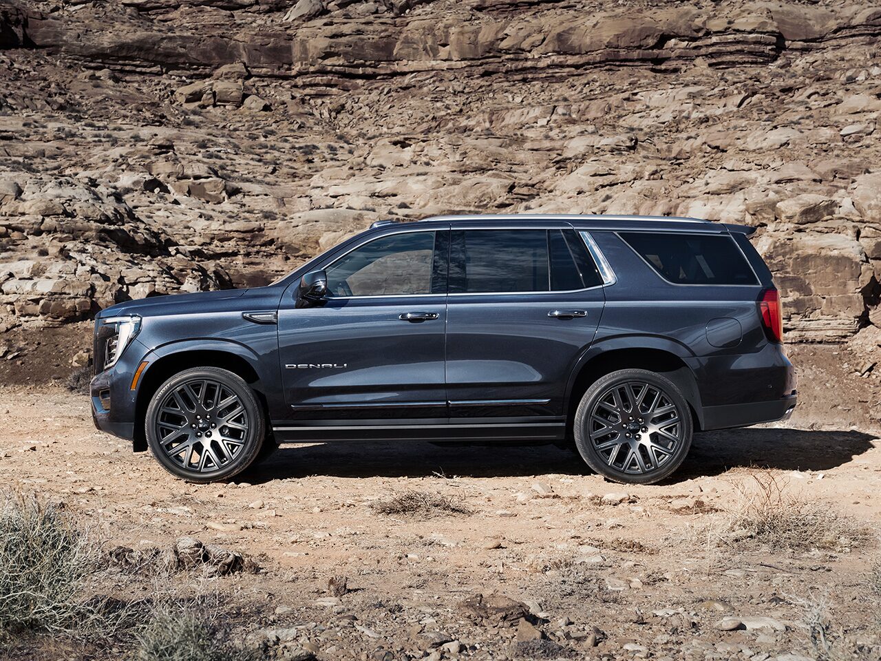 Profile View of the 2026 GMC Yukon Elevation Full-Size SUV Displaying the Off-Road Capabilities