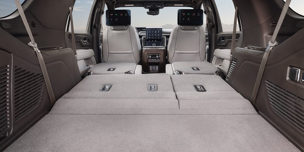 Interior View From the Open Tailgate on the 2026 GMC Yukon Elevation with the Rear Seats Folded Down