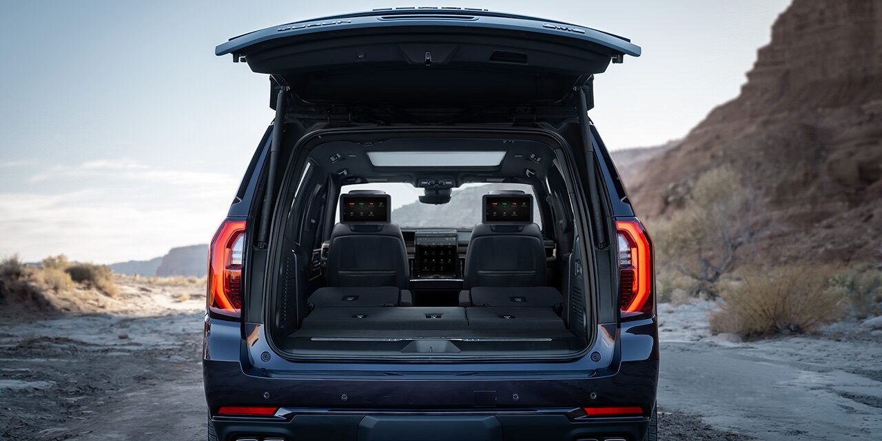 Exterior Rear View of the Open Tailgate Displaying the Cargo Space in the 2026 GMC Yukon