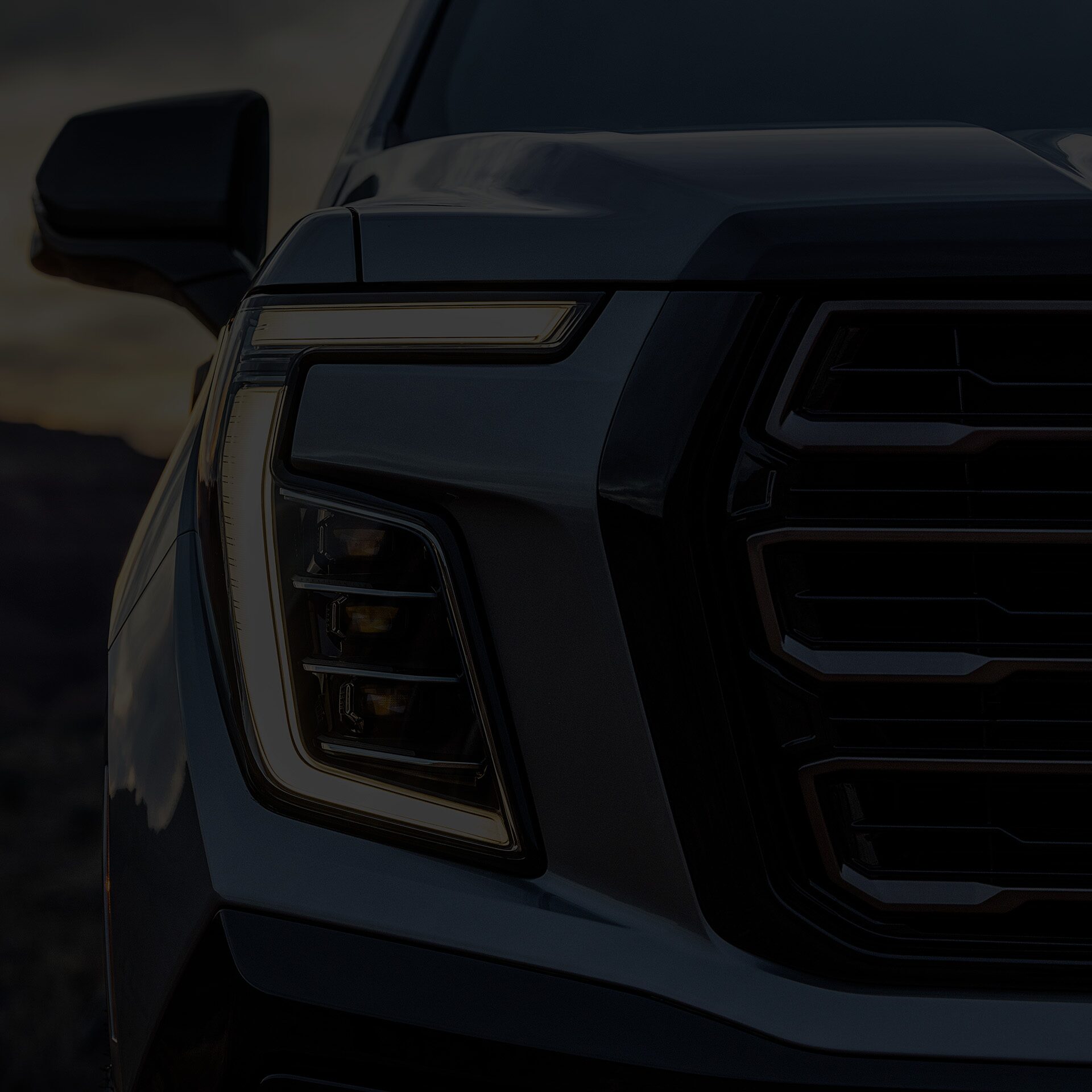 Exterior Close-up View of the Headlamp on the GMC Yukon