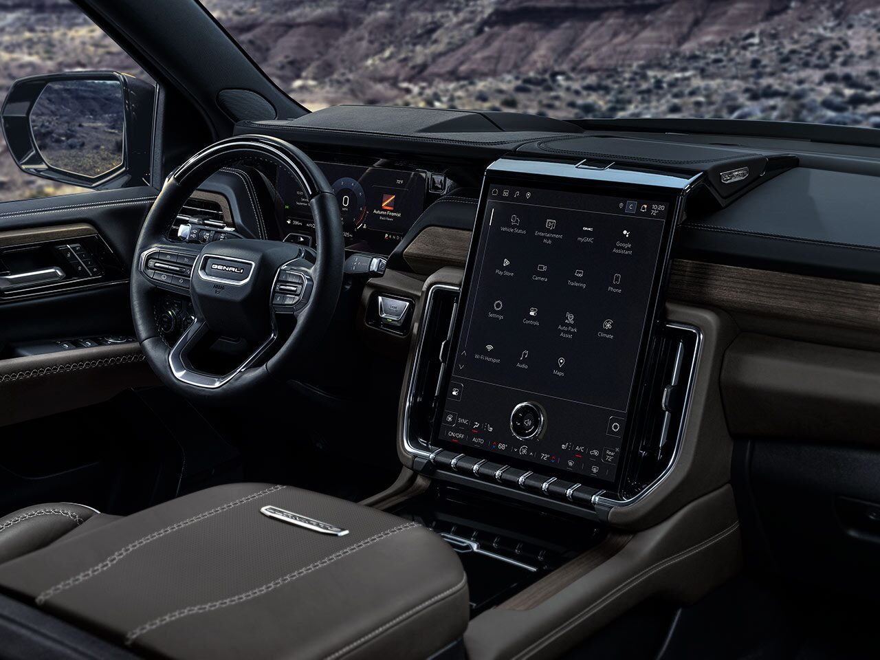 Interior View From the Passenger Side of the Steering Wheel and the Infotainment System in the 2026 Yukon