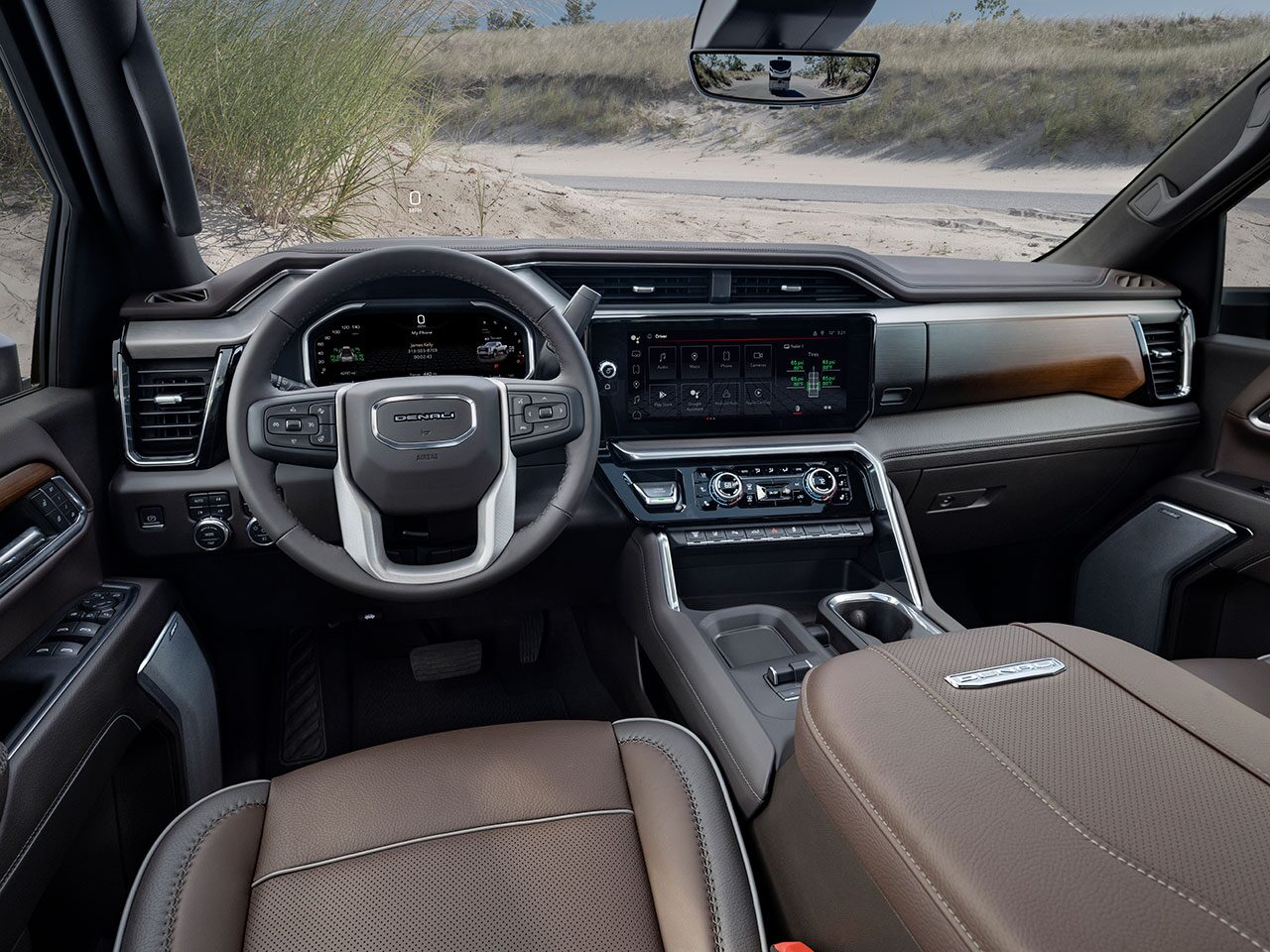 Driver Side Interior View of the Steering Wheel and Dashboard in the 2026 GMC Sierra HD Heavy Duty Truck