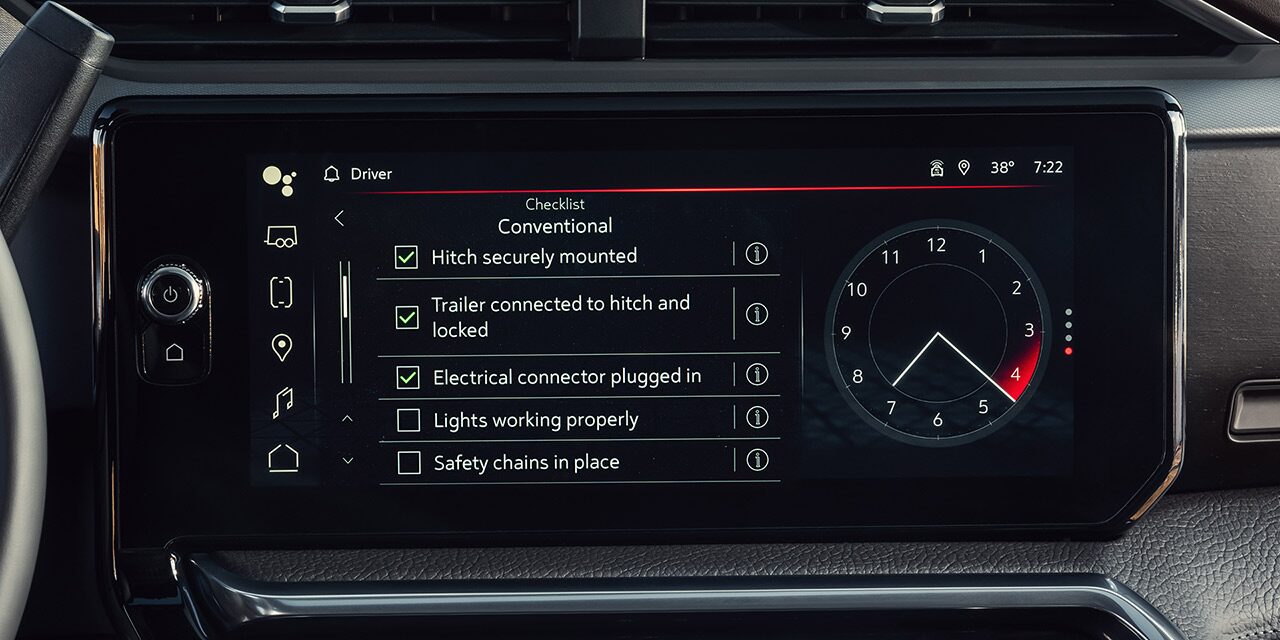 Close-up of the GMC Infotainment Screen in the GMC Sierra HD Heavy Duty Truck Displaying the Prograde Trailering Tech