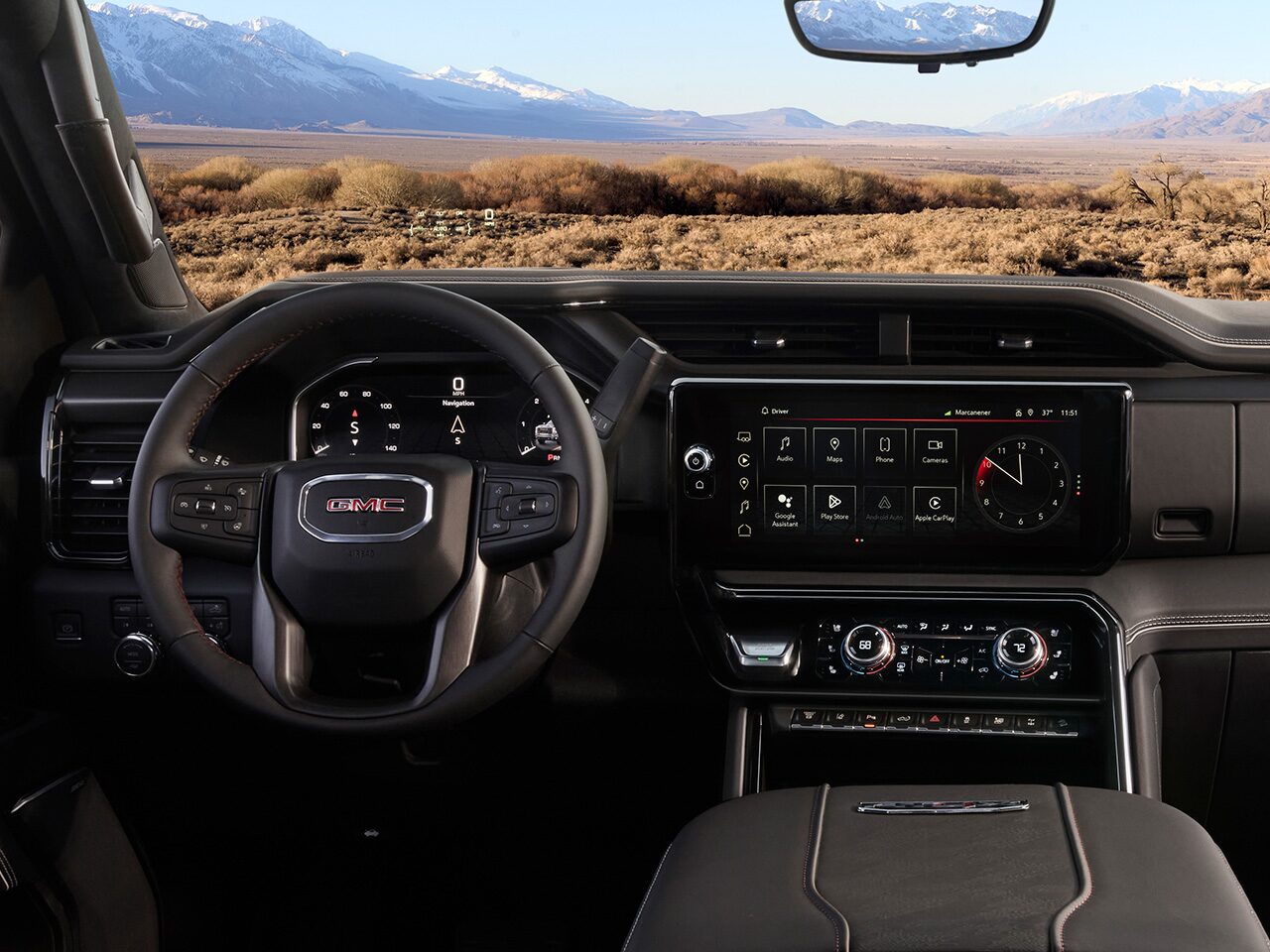The Interior View of the Steering Wheel and Dashboard in the 2026 GMC Sierra HD Heavy Duty Truck