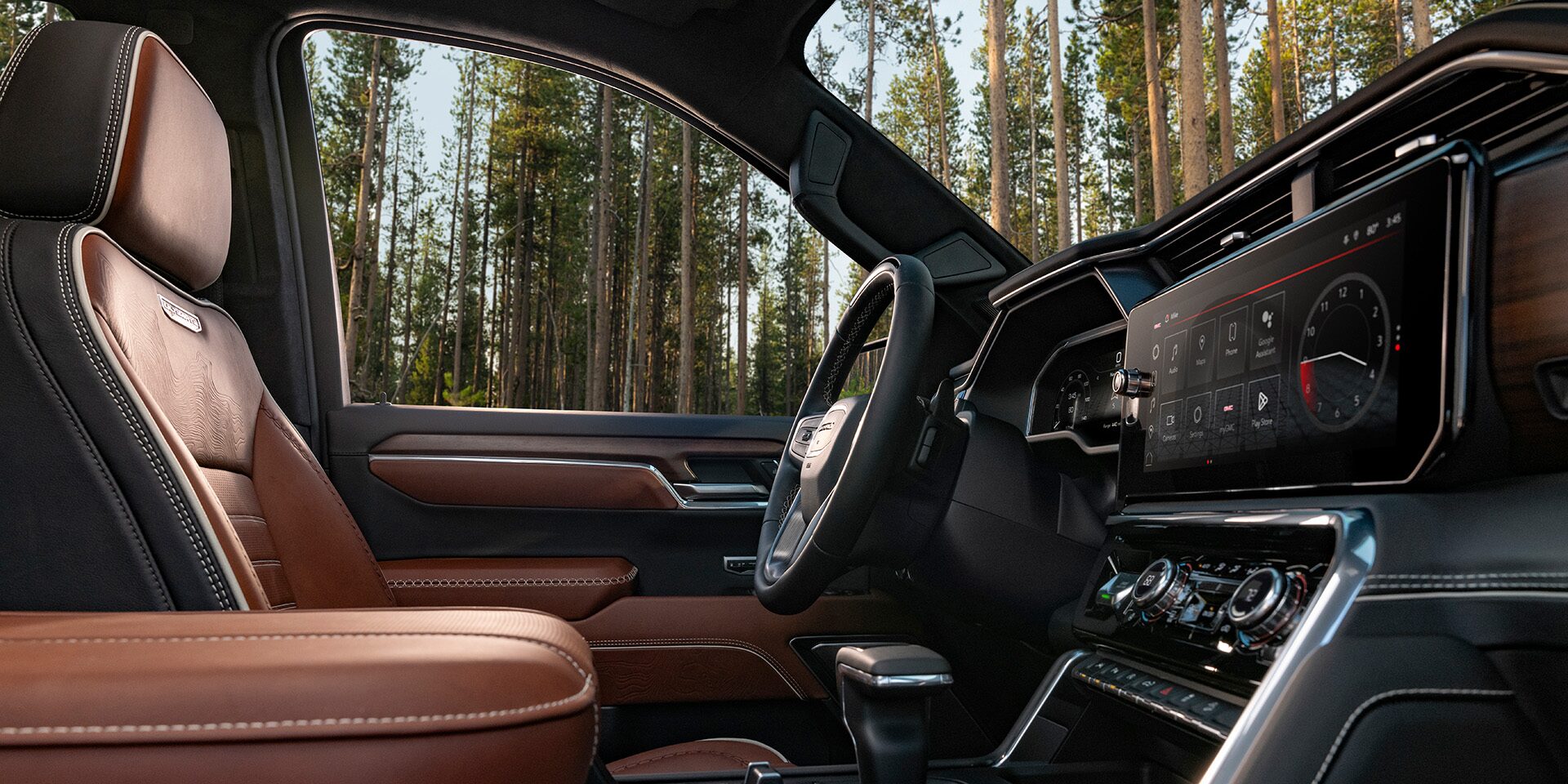 Interior View From the Passenger Side of the Front Row Seating in the 2026 GMC Sierra 1500 Pickup Truck