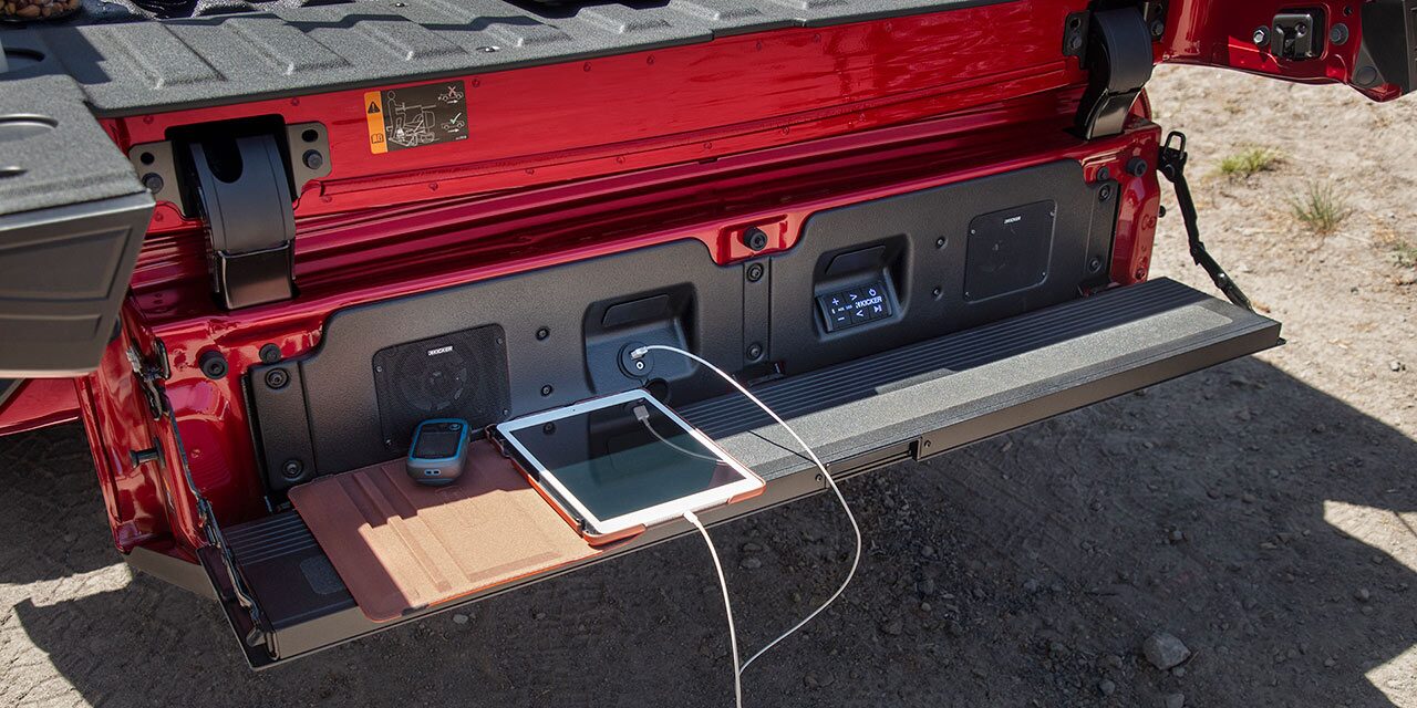 Exterior View of an iPad Plugged into the Mutlipro Audio System on the 2026 GMC Sierra 1500 Pickup Truck