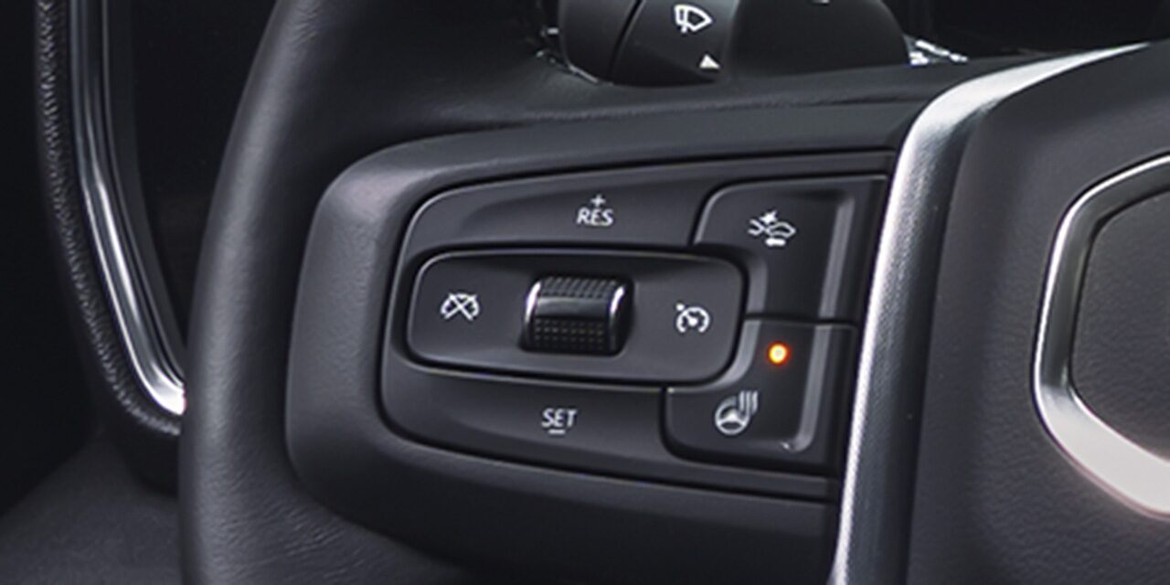 Close-up of the Super Cruise Controls on the GMC Steering Wheel